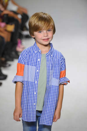 NEW YORK, NY - OCTOBER 18: A model walks the runway during the Anasai preview at petitePARADE Kids Fashion Week at Bathhouse Studios on October 18, 2014 in New York City.のeditorial素材