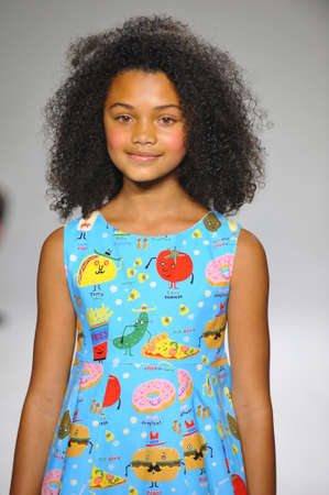 NEW YORK, NY - OCTOBER 19: A model walks the runway during the Aria Children's Clothing preview at petitePARADE / Kids Fashion Week at Bathhouse Studios on October 19, 2014 in New York City.のeditorial素材
