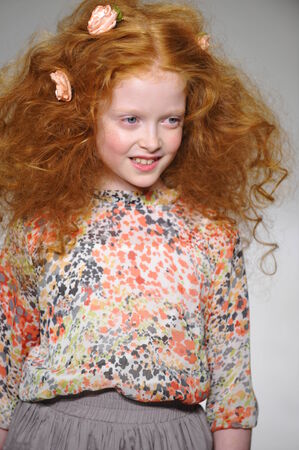 NEW YORK, NY - OCTOBER 19: A model walks the runway during the Charm preview at petitePARADE  Kids Fashion Week at Bathhouse Studios on October 19, 2014 in New York City.のeditorial素材