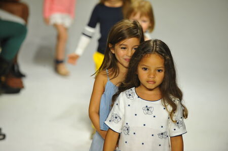 NEW YORK, NY - OCTOBER 18: Models walk the runway finale during the Chloe preview at petitePARADE Kids Fashion Week at Bathhouse Studios on October 18, 2014 in New York City.のeditorial素材
