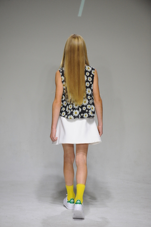 NEW YORK, NY - OCTOBER 19: A model walks the runway during the Bonnie Young preview at petitePARADE Kids Fashion Week at Bathhouse Studios on October 19, 2014 in New York City.のeditorial素材