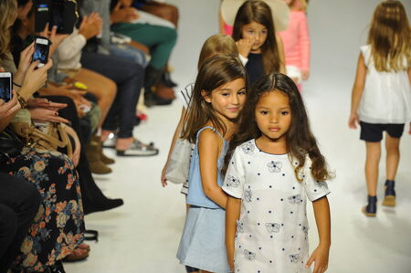 NEW YORK, NY - OCTOBER 18: Models walk the runway finale during the Chloe preview at petitePARADE Kids Fashion Week at Bathhouse Studios on October 18, 2014 in New York City.のeditorial素材
