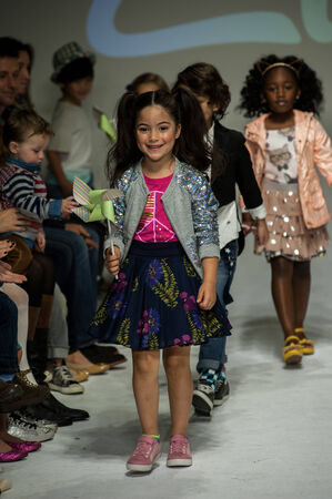 NEW YORK, NY - OCTOBER 19: Models walk the runway finale during the Clarks preview at petitePARADE Kids Fashion Week at Bathhouse Studios on October 19, 2014 in New York City.のeditorial素材