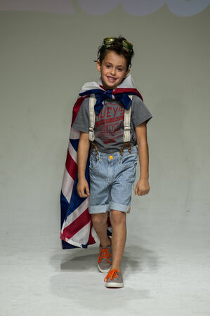 NEW YORK, NY - OCTOBER 19: A model walks the runway during the Clarks preview at petitePARADE Kids Fashion Week at Bathhouse Studios on October 19, 2014 in New York City.のeditorial素材