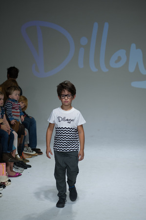 NEW YORK, NY - OCTOBER 19: A model walks the runway during the Dillonger Clothing preview at petitePARADE Kids Fashion Week at Bathhouse Studios on October 19, 2014 in New York City.のeditorial素材