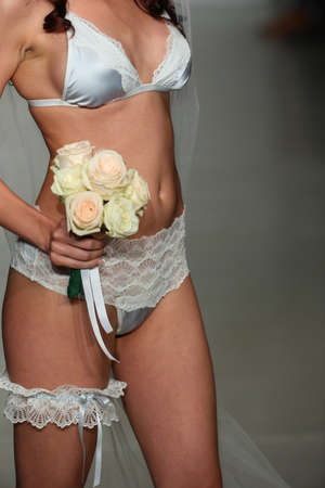 NEW YORK, NY - OCTOBER 25: A model walks runway at Finale Runway Show during Lingerie Fashion week closing benefit Spring 2015 collections at the Center 548 on October 25, 2014 in New York City.のeditorial素材