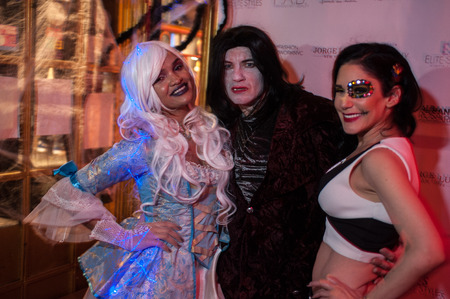 NEW YORK, NY - OCTOBER 31: Guests in mascarade costumes posing at The Fashion Party during Halloween event at the West Village Crema Restaurant on October 31, 2014 in New York City.のeditorial素材