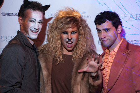 NEW YORK, NY - OCTOBER 31: Guests in mascarade costumes posing at The Fashion Party during Halloween event at the West Village Crema Restaurant on October 31, 2014 in New York City.のeditorial素材