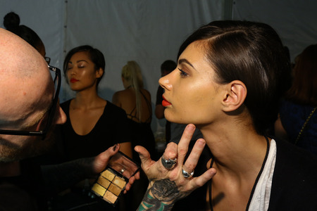 NEW YORK, NY - SEPTEMBER 05: A model getting ready backstage at the Carmen Marc Valvo 25th Anniversary show during MBFW Spring 2015 at Lincoln Center on September 5, 2014 in NYCのeditorial素材