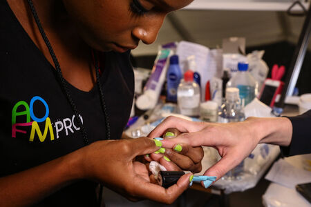 NEW YORK, NY - SEPTEMBER 06: A model getting ready backstage at the Lie Sang Bong Spring 2015 Collection Show during MBFW Spring 2015  at Lincoln Center on September 06, 2014 in NYC.のeditorial素材