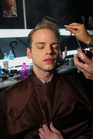 NEW YORK, NY - SEPTEMBER 05: A model getting ready backstage at the Carmen Marc Valvo 25th Anniversary show during MBFW Spring 2015 at Lincoln Center on September 5, 2014 in NYCのeditorial素材