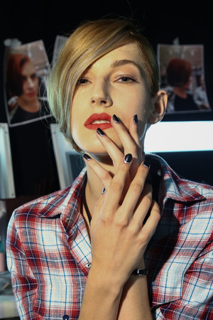 NEW YORK, NY - SEPTEMBER 05: A model poses backstage at the Carmen Marc Valvo 25th Anniversary show during MBFW Spring 2015 at Lincoln Center on September 5, 2014 in NYCのeditorial素材