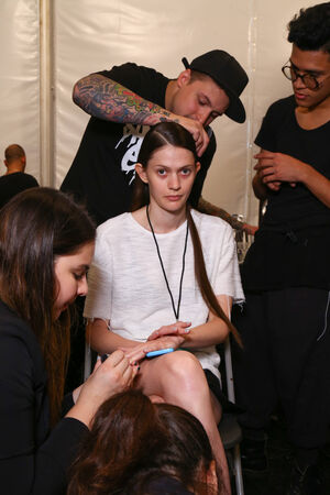 NEW YORK, NY - SEPTEMBER 06: A model getting ready backstage at the Lie Sang Bong Spring 2015 Collection Show during MBFW Spring 2015  at Lincoln Center on September 06, 2014 in NYC.のeditorial素材