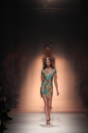 MILAN, ITALY - SEPTEMBER 19: A model walks the runway during the Blumarine show as a part of Milan Fashion Week Womenswear Spring/Summer 2015 on September 19, 2014 in Milan, Italyのeditorial素材