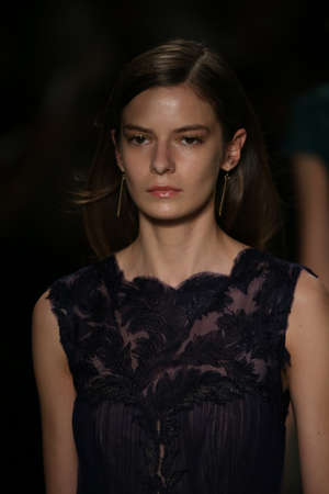 NEW YORK, NY - FEBRUARY 12: Models walk the runway finale at the Tadashi Shoji show during...