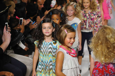 NEW YORK, NY - OCTOBER 18: Models walk the runway during the Imoga preview at petitePARADE / Kids Fashion Week at Bathhouse Studios on October 18, 2014 in New York City.のeditorial素材