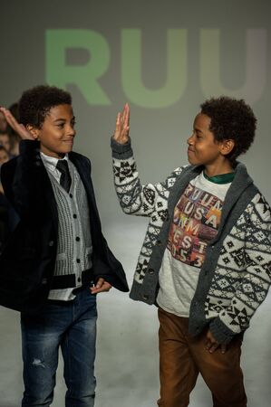 NEW YORK, NY - OCTOBER 19: Models walk the runway during the Ruum preview at petitePARADE / Kids Fashion Week at Bathhouse Studios on October 19, 2014 in New York City.のeditorial素材