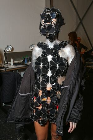 NEW YORK, NY - FEBRUARY 15: A model getting ready backstage at the FTL Moda fashion show during MBFW Fall 2015 at The Salon at Lincoln Center on February 15, 2015 in NYC.のeditorial素材
