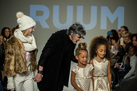 NEW YORK, NY - OCTOBER 19: Designer Nina Miner walks the runway with models during the Ruum preview at petitePARADE / Kids Fashion Week at Bathhouse Studios on October 19, 2014 in New York City.のeditorial素材