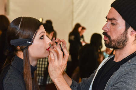NEW YORK, NY - FEBRUARY 13: A model getting ready backstage at the Monique Lhuillier fashion show during MBFW Fall 2015 at Lincoln Center on February 13, 2015 in NYCのeditorial素材