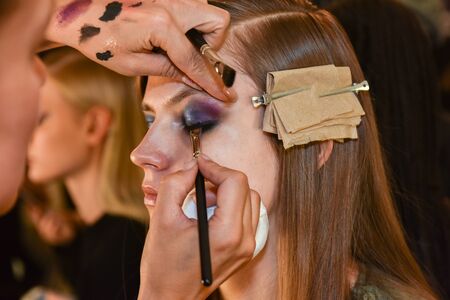 NEW YORK, NY - FEBRUARY 13: A model getting ready backstage at the Monique Lhuillier fashion show during MBFW Fall 2015 at Lincoln Center on February 13, 2015 in NYCのeditorial素材