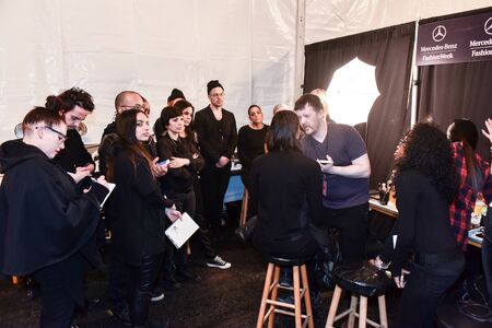 NEW YORK, NY - FEBRUARY 13: A makeup team backstage at the Nicole Miller fashion show during MBFW Fall 2015 at Lincoln Center on February 13, 2015 in NYC.