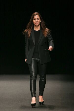 NEW YORK, NY - FEBRUARY 13: Designer Monique Lhullier walks the runway at the Monique Lhuillier fashion show during MBFW Fall 2015 at Lincoln Center on February 13, 2015 in NYCのeditorial素材