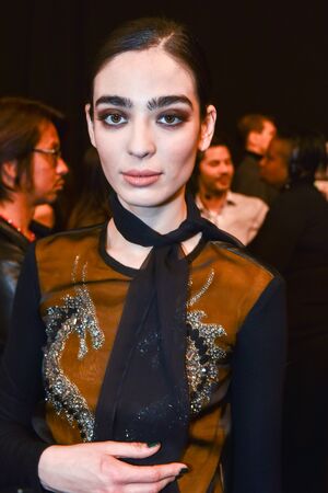 NEW YORK, NY - FEBRUARY 13: A model getting ready backstage at the Nicole Miller fashion show during MBFW Fall 2015 at Lincoln Center on February 13, 2015 in NYC.のeditorial素材