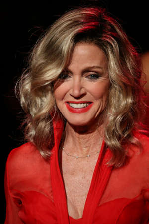 NEW YORK, NY - FEBRUARY 12: Donna Mills walks the runway at the Go Red For Women Red Dress Collection 2015 presented by Macy's fashion show during MBFW Fall 2015 at Lincoln Center on February 12, 2015 in NYCのeditorial素材
