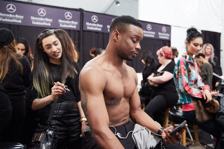 NEW YORK, NY - FEBRUARY 19: A model getting ready backstage at the New York Life fashion show during MBFW Fall 2015 at Lincoln Center on February 19, 2015 in NYC.のeditorial素材