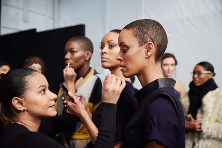 NEW YORK, NY - FEBRUARY 19: Models getting ready backstage at the New York Life fashion show during MBFW Fall 2015 at Lincoln Center on February 19, 2015 in NYC.のeditorial素材