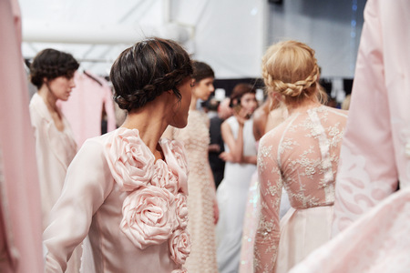 NEW YORK, NY - FEBRUARY 19: A model getting ready backstaget at the New York Life fashion show during MBFW Fall 2015 at Lincoln Center on February 19, 2015 in NYC.のeditorial素材