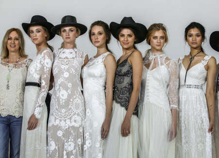 NEW YORK, NY - APRIL 17:Designer Claire Pettibone poses with models at the Claire Pettibone Bridal SS 2016 Runway Show at Industry Studios on April 17, 2015 in NYCのeditorial素材