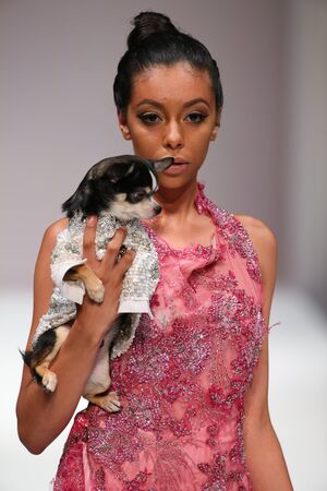 NEW YORK, NY - SEPTEMBER 12: A model walks the runway at the Anthony Rubio fashion show during Spring 2016 New York Fashion Week at Gotham Hall on September 12, 2015 in New York City.のeditorial素材