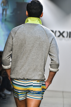 NEW YORK, NY - OCTOBER 14: Model walks the runway during 2(X)IST Men's Spring/Summer 2016 Runway Show at Skyline Modern on October 14, 2015 in NYCのeditorial素材