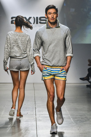 NEW YORK, NY - OCTOBER 14: Model walks the runway during 2(X)IST Men's Spring/Summer 2016 Runway Show at Skyline Modern on October 14, 2015 in NYCのeditorial素材