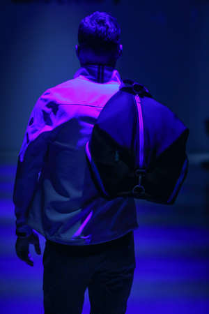 NEW YORK, NY - OCTOBER 14: A model walks the runway during 2(X)IST Men's Spring/Summer 2016 Runway Show at Skyline Modern on October 14, 2015 in NYC.のeditorial素材