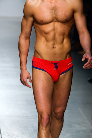 NEW YORK, NY - OCTOBER 14: A model walks the runway during 2(X)IST Men's Spring/Summer 2016 Runway Show at Skyline Modern on October 14, 2015 in NYC.のeditorial素材