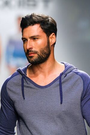 NEW YORK, NY - OCTOBER 14: A model walks the runway during 2(X)IST Men's Spring/Summer 2016 Runway Show at Skyline Modern on October 14, 2015 in NYC.のeditorial素材