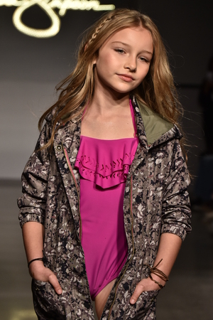 NEW YORK, NY - OCTOBER 17: A model walks runway at Jessica Simpson Collection Fall/Winter 2016 Runway Show during petiteParade at The Spring Studio on October 17, 2015 in NYC.のeditorial素材