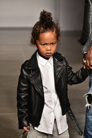 NEW YORK, NY - OCTOBER 17: Father and kid model walks runway at Laer Fall/Winter 2016 Runway Show during petiteParade at The Spring Studio on October 17, 2015 in NYC.のeditorial素材