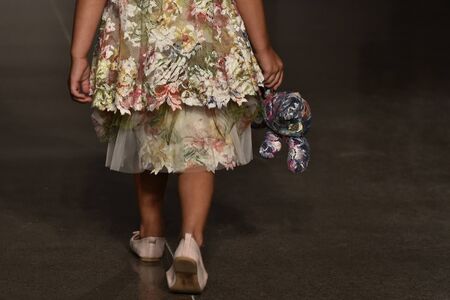 NEW YORK, NY - OCTOBER 17: A model walks runway at Olvi's Fall/Winter 2016 Runway Show during petiteParade at The Spring Studio on October 17, 2015 in NYC.のeditorial素材