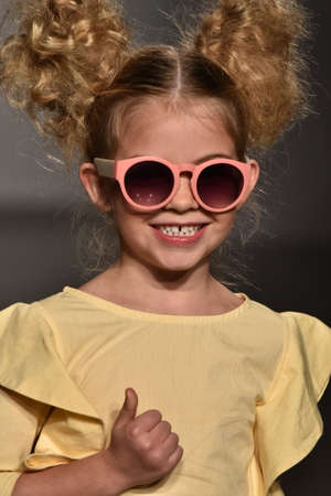 NEW YORK, NY - OCTOBER 17: A model walks runway at Martin Morgan Fall/Winter 2016 Runway Show during petiteParade at The Spring Studio on October 17, 2015 in NYC.のeditorial素材