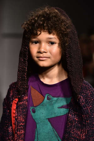 NEW YORK, NY - OCTOBER 17: A model walks runway at The New School Parsons Fall/Winter 2016 Runway Show during petiteParade at The Spring Studio on October 17, 2015 in NYC.のeditorial素材