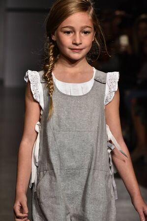 NEW YORK, NY - OCTOBER 17: A model walks runway at The New School Parsons Fall/Winter 2016 Runway Show during petiteParade at The Spring Studio on October 17, 2015 in NYC.のeditorial素材