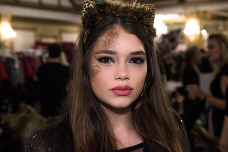 NEW YORK, NY - OCTOBER 31: Guests in mascarade costumes posing at The Fashion Party during Halloween event at the Vermillon NYC club on October 31, 2015 in New York City.のeditorial素材
