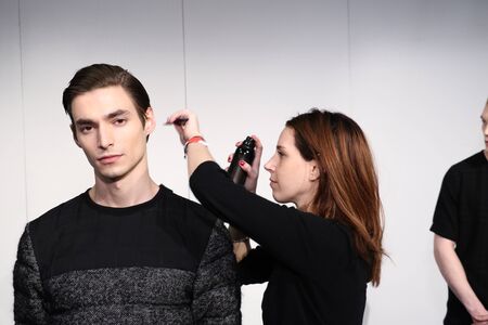 NEW YORK, NY - FEBRUARY 01: A model getting ready backstage before Lucio Castro's Presentation at New York Fashion Week Men's Fall/Winter 2016 at Industria Superstudio on February 1, 2016 in New York City.のeditorial素材