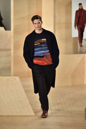 NEW YORK, NY - FEBRUARY 03: A model walks the runway wearing Perry Ellis during New York Fashion...