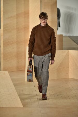 NEW YORK, NY - FEBRUARY 03: A model walks the runway wearing Perry Ellis during New York Fashion...