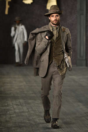 NEW YORK, NY - FEBRUARY 02: A model walks the runway at the Joseph Abboud Runway Show during New...